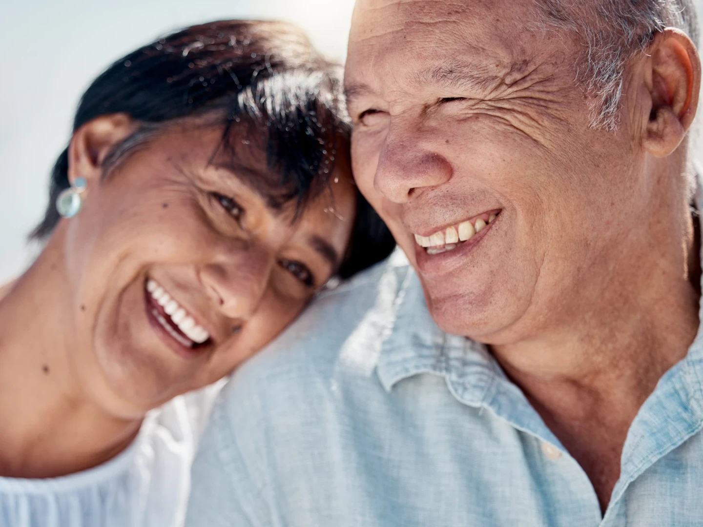 Happy senior couple smiling together | Welcome to Bartow Dental Arts, where our patients are our family | Locally-owned and operated dentist in Bartow, FL